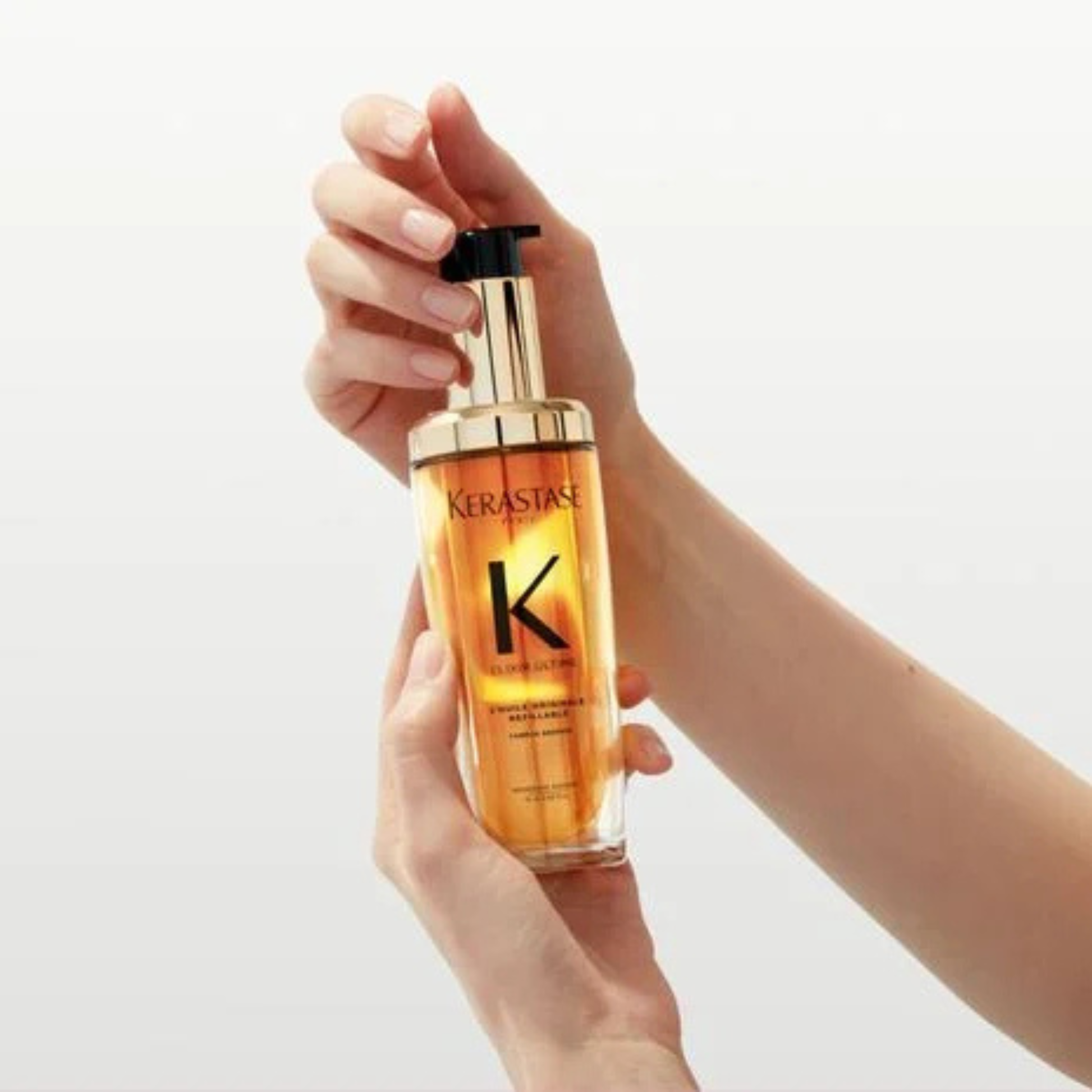 Bauhaus Salon + Spa Lake Charles featuring Kérastase Elixir Ultime Refillable Hydrating Hair Oil professional treatment display